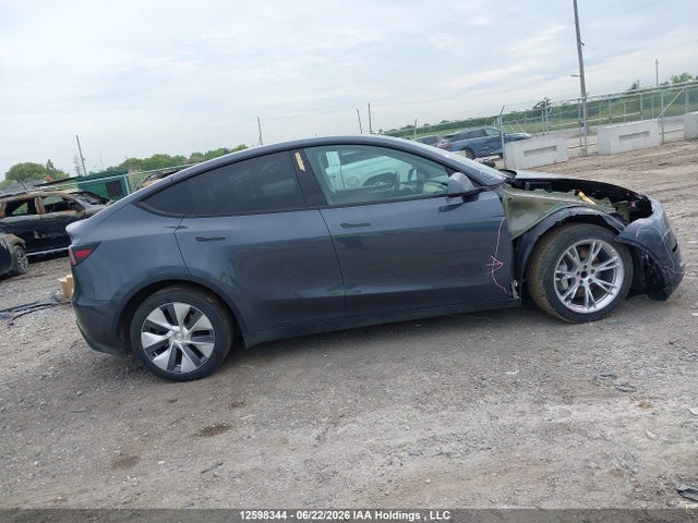 Tesla Model Y 2023 LRWYGDFD0PC163415 Image 14