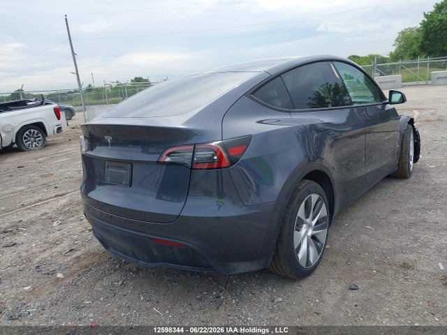 Tesla Model Y 2023 LRWYGDFD0PC163415 Image 4