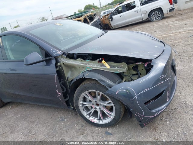 Tesla Model Y 2023 LRWYGDFD0PC163415 Image 6
