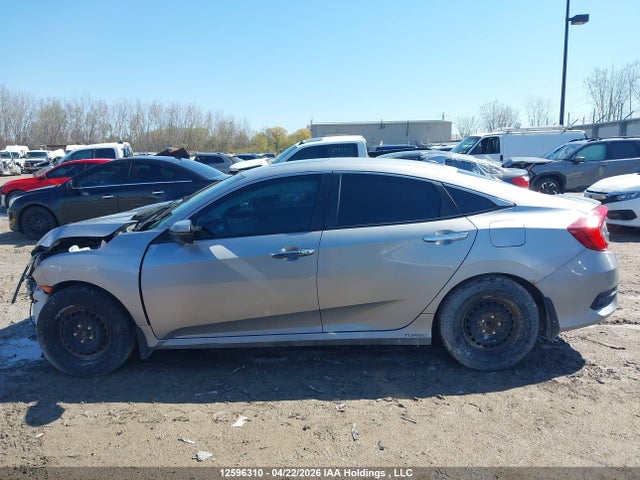 12596310 :رقم المزاد ، 2HGFC1F95HH102836 vin ، 2017 Honda Civic Touring مزاد بيع