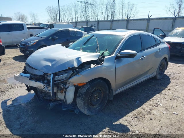 12596310 :رقم المزاد ، 2HGFC1F95HH102836 vin ، 2017 Honda Civic Touring مزاد بيع