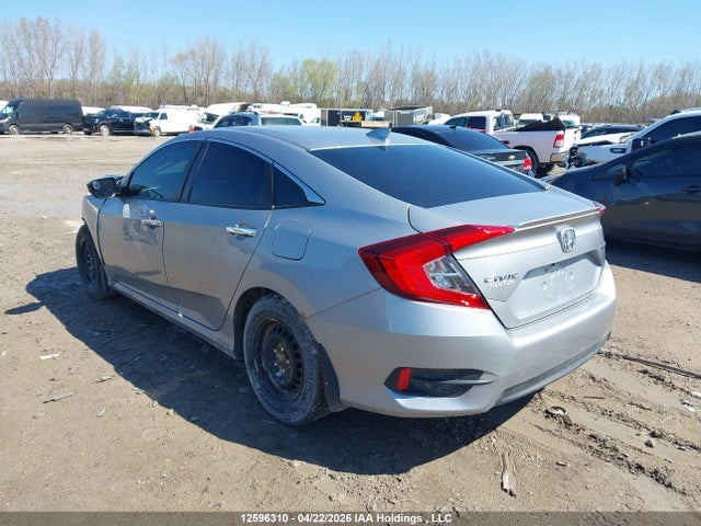 12596310 :رقم المزاد ، 2HGFC1F95HH102836 vin ، 2017 Honda Civic Touring مزاد بيع