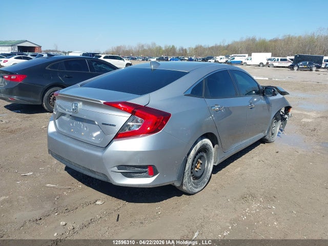12596310 :رقم المزاد ، 2HGFC1F95HH102836 vin ، 2017 Honda Civic Touring مزاد بيع