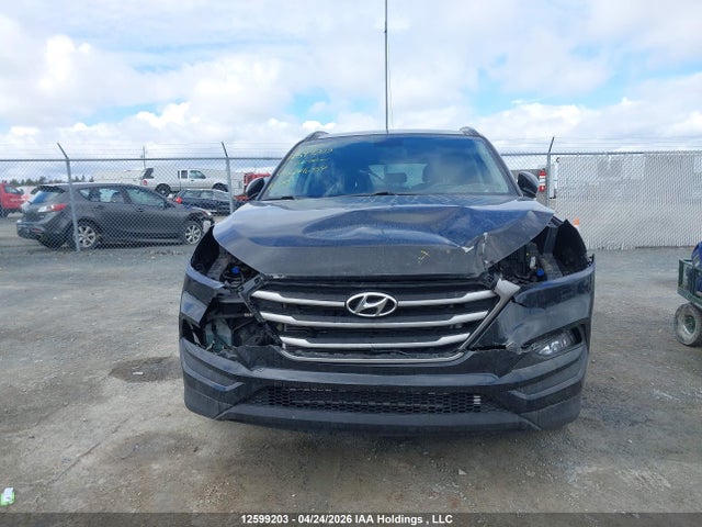 KM8J33A44HU524654 Hyundai TUCSON SE
