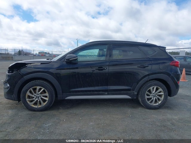 KM8J33A44HU524654 Hyundai TUCSON SE