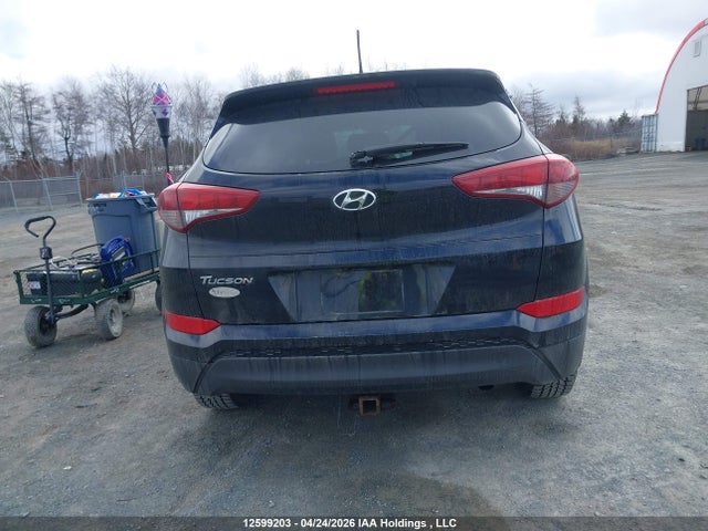 KM8J33A44HU524654 Hyundai TUCSON SE
