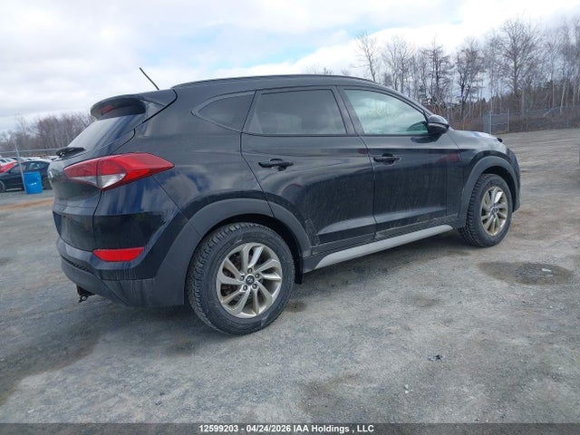 KM8J33A44HU524654 Hyundai TUCSON SE