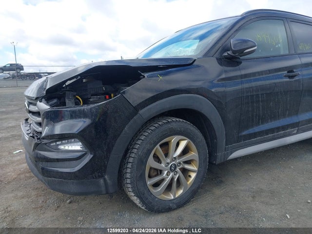 KM8J33A44HU524654 Hyundai TUCSON SE