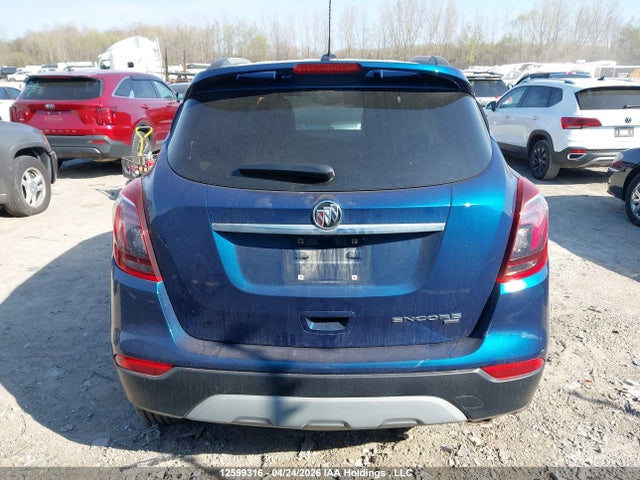 12599316 :رقم المزاد ، KL4CJ2SM6KB781811 vin ، 2019 Buick Encore Sport Touring مزاد بيع