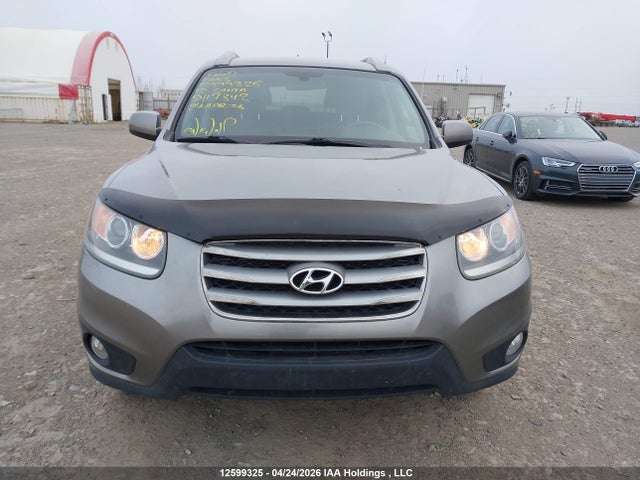 Auction sale of the 2012 Hyundai Santa Fe Gl 3.5, vin: 5XYZGDAG0CG117842, lot number: 12599325