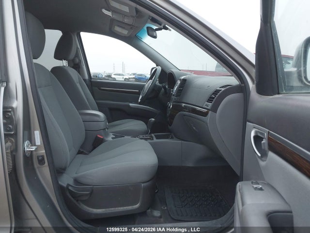 Auction sale of the 2012 Hyundai Santa Fe Gl 3.5, vin: 5XYZGDAG0CG117842, lot number: 12599325