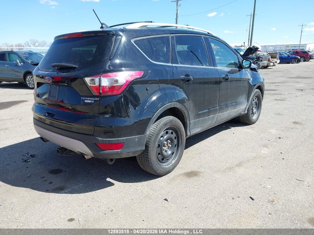 Продажа на аукционе авто 2018 Ford Escape Titanium, vin: 1FMCU9J97JUB00637, номер лота: 12593518