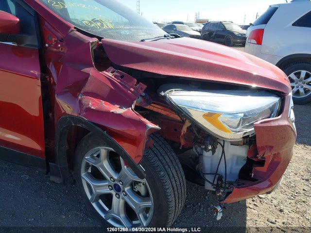 Продажа на аукционе авто 2017 Ford Escape Titanium, vin: 1FMCU9J97HUD00962, номер лота: 12601268