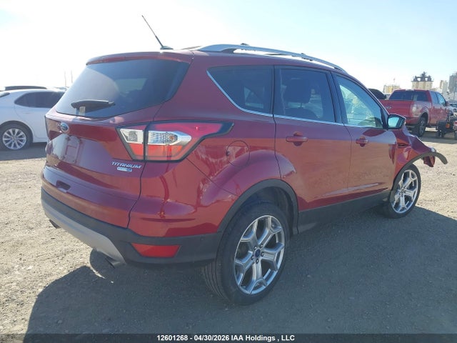 Продажа на аукционе авто 2017 Ford Escape Titanium, vin: 1FMCU9J97HUD00962, номер лота: 12601268
