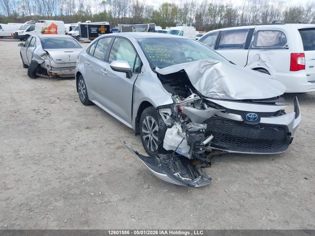 12601586 :رقم المزاد ، JTDBAMDE5MJ006198 vin ، 2021 Toyota Corolla Hybrid Base W/li Battery مزاد بيع