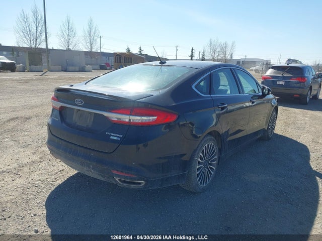 2017 Ford Fusion Titanium მანქანა იყიდება აუქციონზე, vin: 3FA6P0D94HR147700, აუქციონის ნომერი: 12601964