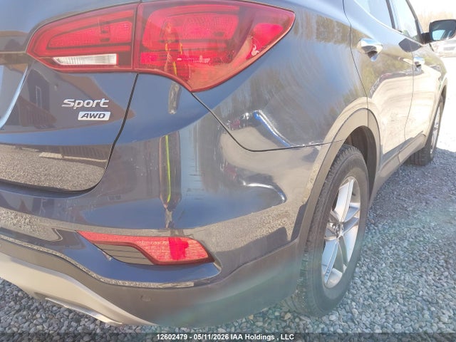 12602479 :رقم المزاد ، 5XYZUDLB3JG519930 vin ، 2018 Hyundai Santa Fe Sport مزاد بيع