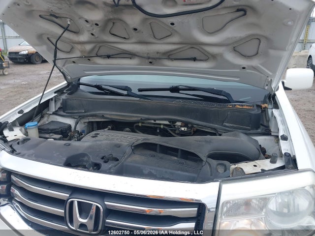 Продаж на аукціоні авто 2014 Honda Pilot Touring, vin: 5FNYF4H98EB502646, номер лоту: 12602750