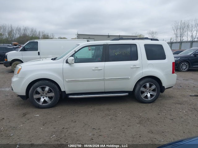 Продаж на аукціоні авто 2014 Honda Pilot Touring, vin: 5FNYF4H98EB502646, номер лоту: 12602750