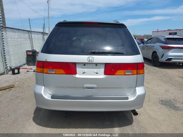 Auction sale of the 2004 Honda Odyssey Ex, vin: 2HKRL18604H005060, lot number: 12602823