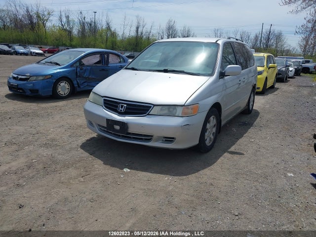 Auction sale of the 2004 Honda Odyssey Ex, vin: 2HKRL18604H005060, lot number: 12602823