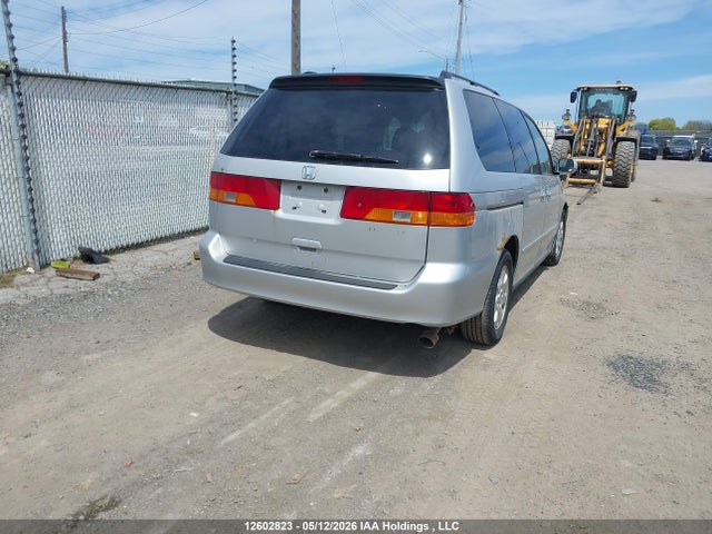 Auction sale of the 2004 Honda Odyssey Ex, vin: 2HKRL18604H005060, lot number: 12602823