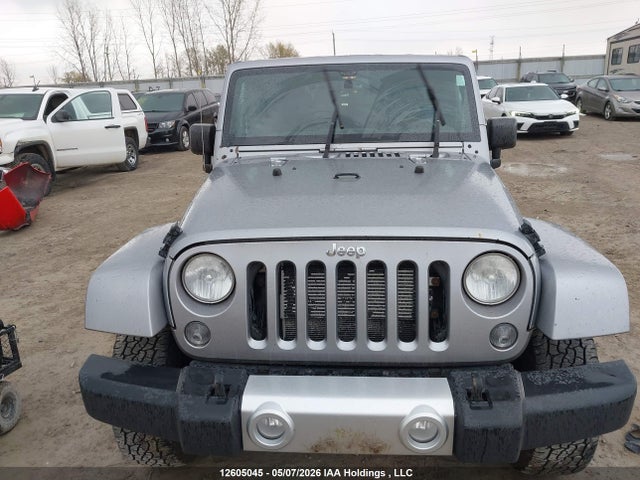 1C4BJWEG1EL259973 Jeep Wrangler Unlimited Sahara