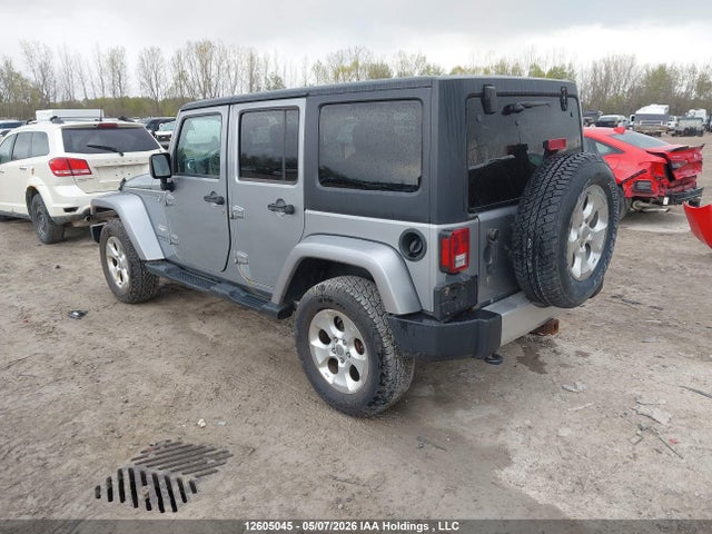 1C4BJWEG1EL259973 Jeep Wrangler Unlimited Sahara