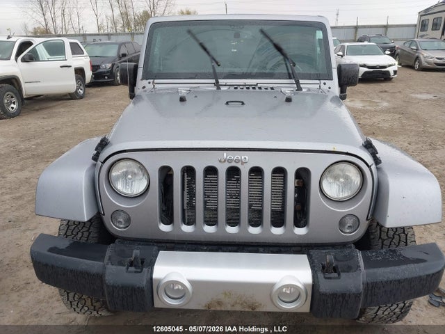 1C4BJWEG1EL259973 Jeep Wrangler Unlimited Sahara
