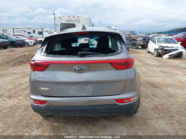 12605213 :رقم المزاد ، KNDPMCAC7J7358282 vin ، 2018 Kia Sportage Lx مزاد بيع