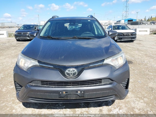 2T3ZFREV0JW498986 Toyota RAV4 LE