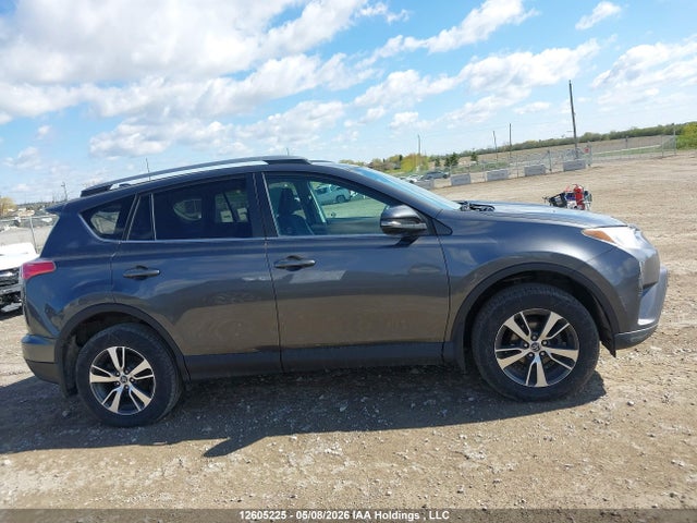 2T3ZFREV0JW498986 Toyota RAV4 LE