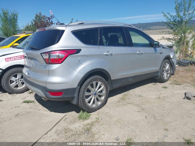 2017 Ford Escape Titanium მანქანა იყიდება აუქციონზე, vin: 1FMCU9J9XHUD21840, აუქციონის ნომერი: 12606135