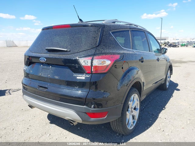 Продаж на аукціоні авто 2018 Ford Escape Titanium, vin: 1FMCU9J96JUC93198, номер лоту: 12606246