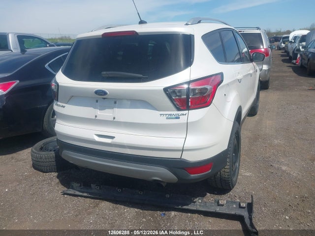 Продажа на аукционе авто 2017 Ford Escape Titanium, vin: 1FMCU9J99HUB92523, номер лота: 12606288
