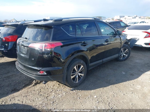 Toyota RAV4 LE 2018 2T3ZFREV2JW454052 Image 4