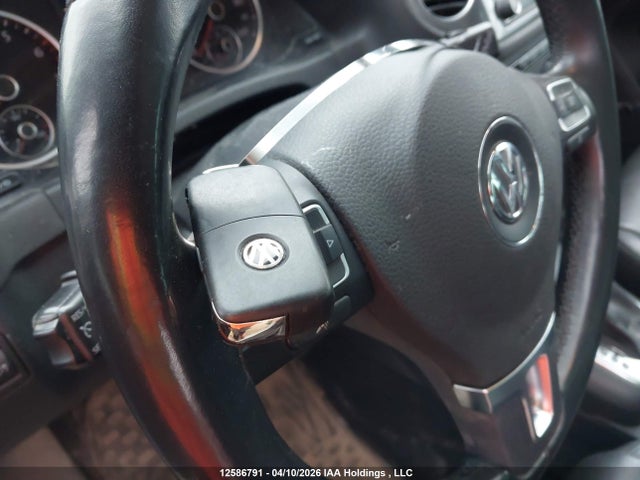 WVGLV7AX5HW504647 Volkswagen Tiguan