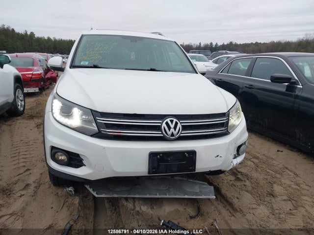 WVGLV7AX5HW504647 Volkswagen Tiguan
