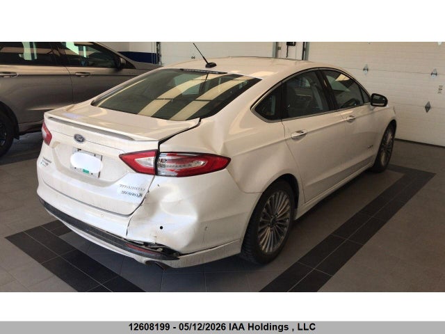 12608199 :رقم المزاد ، 3FA6P0RU1DR286075 vin ، 2013 Ford Fusion Titanium Hev مزاد بيع