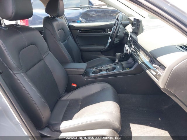 Auction sale of the 2023 Honda Civic Touring, vin: 2HGFE1F98PH002190, lot number: 12609203