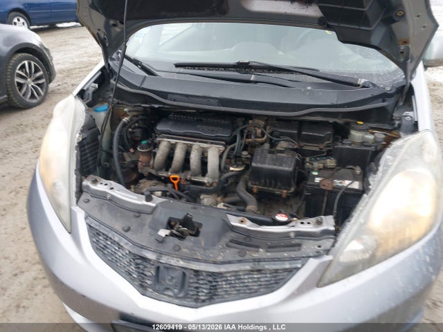 2009 Honda Fit Lx მანქანა იყიდება აუქციონზე, vin: JHMGE87559S807081, აუქციონის ნომერი: 12609419