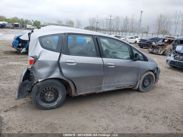 2009 Honda Fit Lx მანქანა იყიდება აუქციონზე, vin: JHMGE87559S807081, აუქციონის ნომერი: 12609419