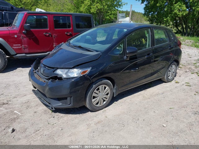 12609671 :رقم المزاد ، 3HGGK5H54HM100487 vin ، 2017 Honda Fit مزاد بيع