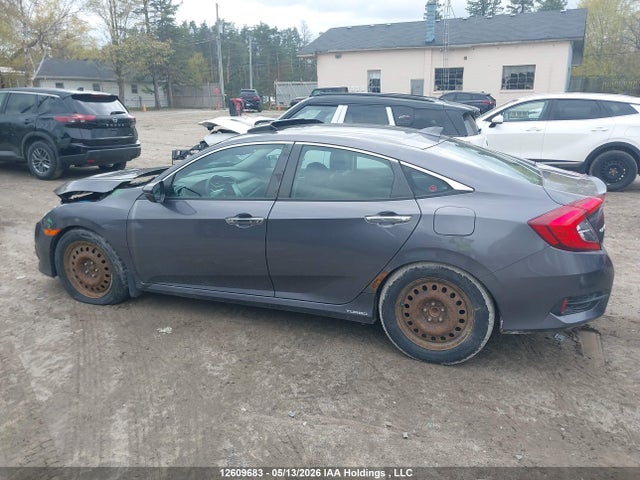 12609683 :رقم المزاد ، 2HGFC1F93HH107551 vin ، 2017 Honda Civic Touring مزاد بيع