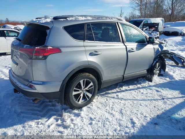12509410 :رقم المزاد ، 2T3BFREV1JW719934 vin ، 2018 Toyota Rav4 Le مزاد بيع