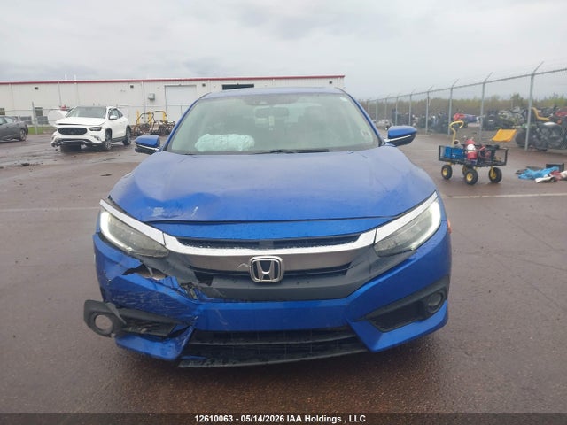 2016 Honda Civic Touring მანქანა იყიდება აუქციონზე, vin: 2HGFC1F97GH111133, აუქციონის ნომერი: 12610063