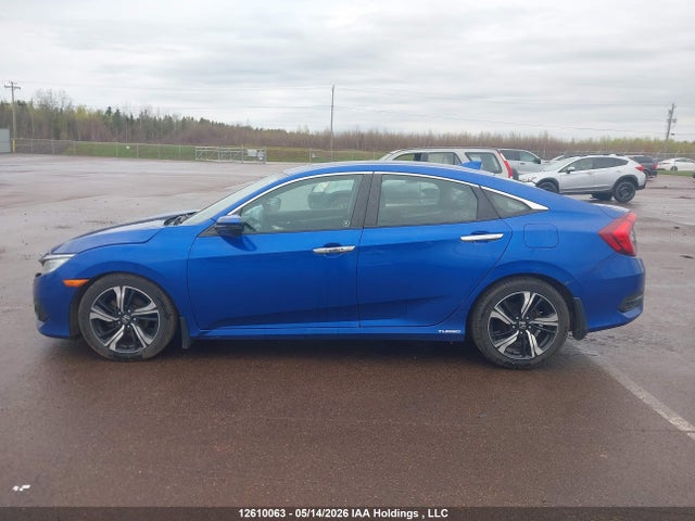 2016 Honda Civic Touring მანქანა იყიდება აუქციონზე, vin: 2HGFC1F97GH111133, აუქციონის ნომერი: 12610063