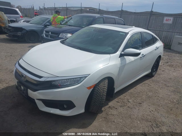 12610090 :رقم المزاد ، 2HGFC1F95HH109561 vin ، 2017 Honda Civic Touring مزاد بيع