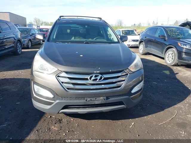 12610396 :رقم المزاد ، 5XYZT3LB1DG069910 vin ، 2013 Hyundai Santa Fe مزاد بيع