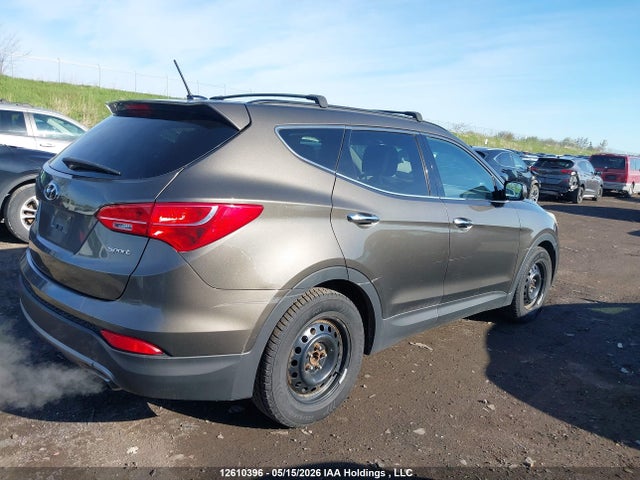12610396 :رقم المزاد ، 5XYZT3LB1DG069910 vin ، 2013 Hyundai Santa Fe مزاد بيع